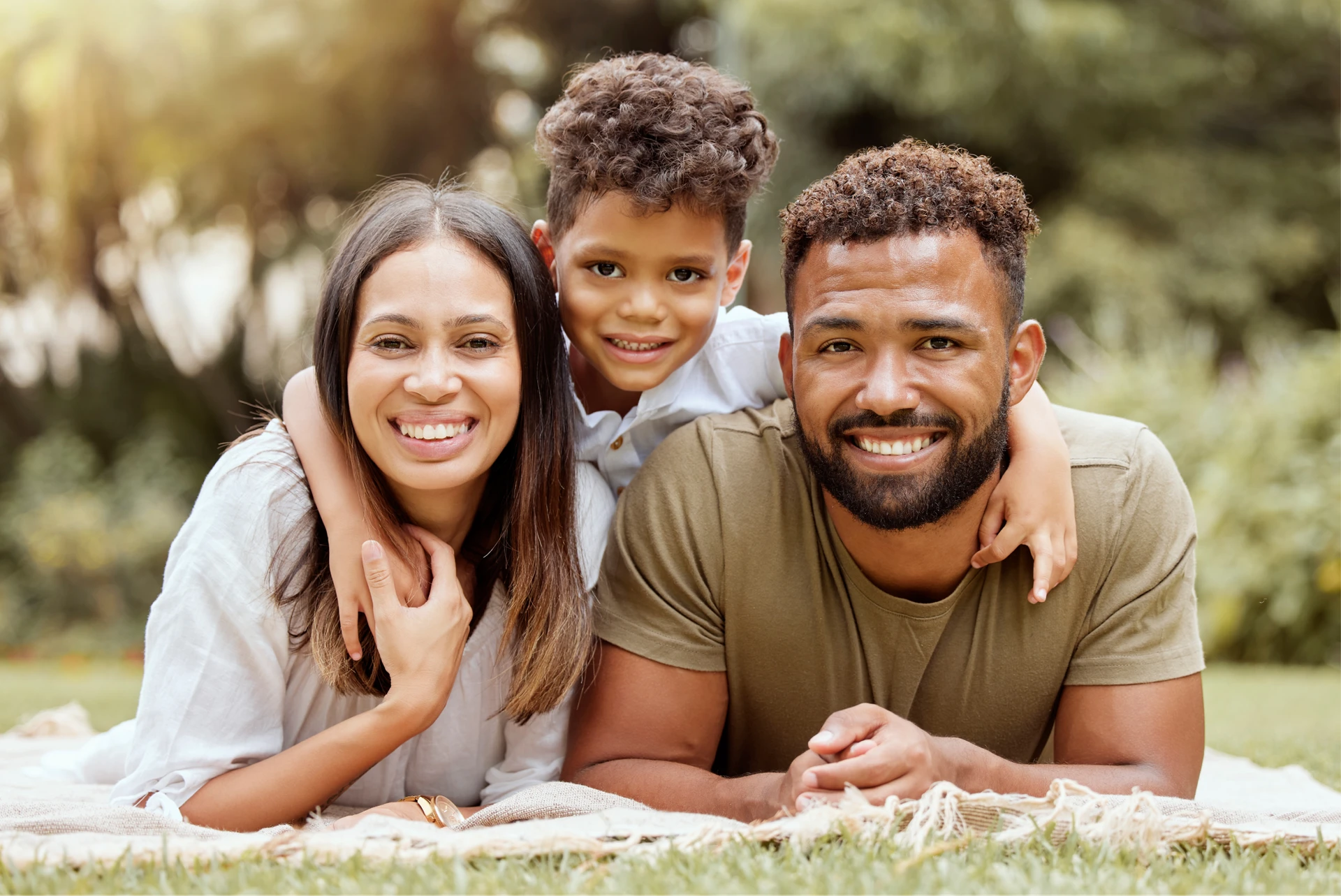 Happy family smiling together at Lefort Orthodontics in Lake Charles, LA
