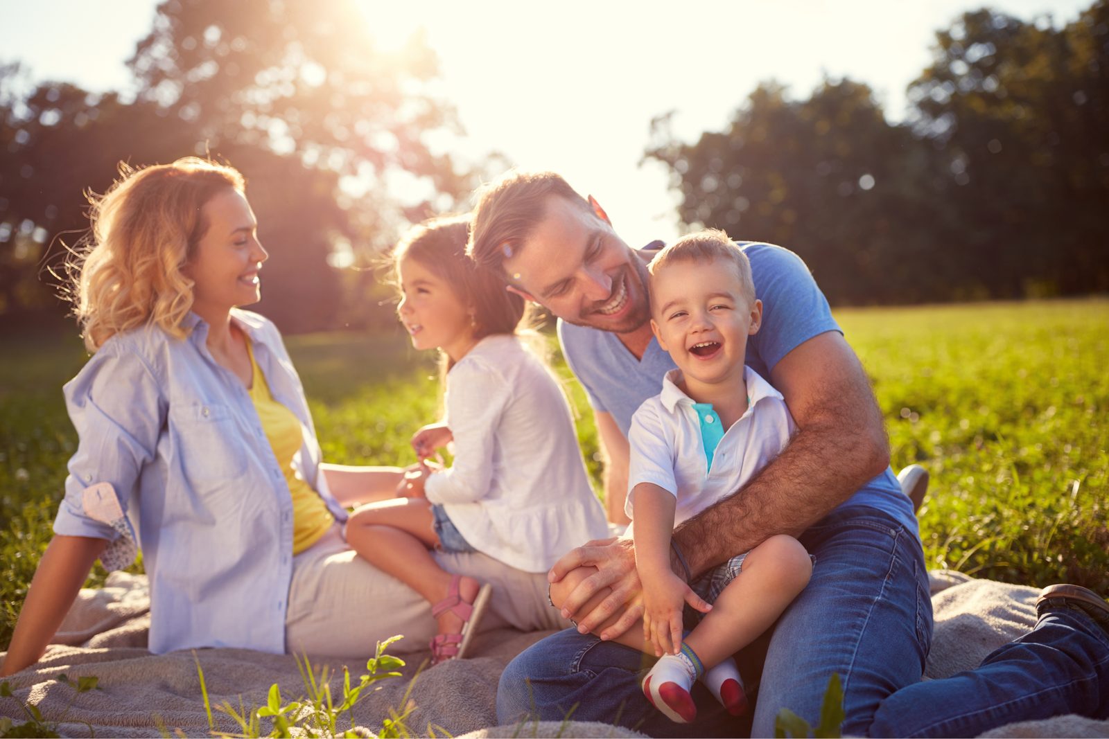 Family smiling together at Lefort Orthodontics in Lake Charles, LA